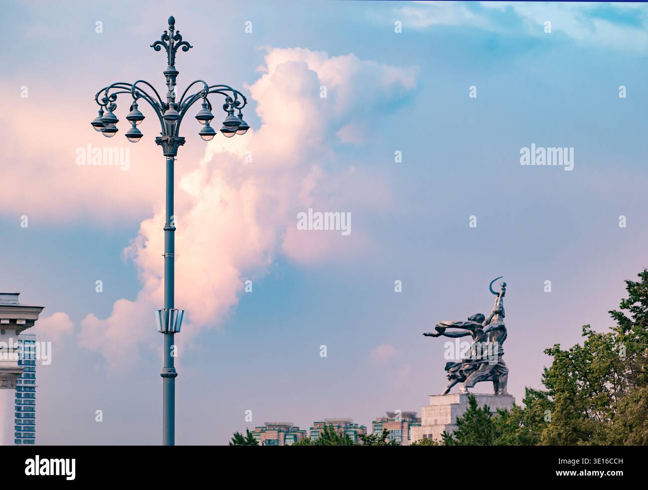 Worker and Kolkhoz Woman monument in Moscow against a colorful sunset sky Stock Photo