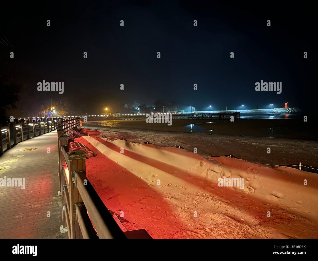 Illuminated Promenade and Rippled Sand Dunes at Night, Mallipo Beach Boardwalk, Chungcheongnam-do South Korea - Smartphone Captured Stock Image