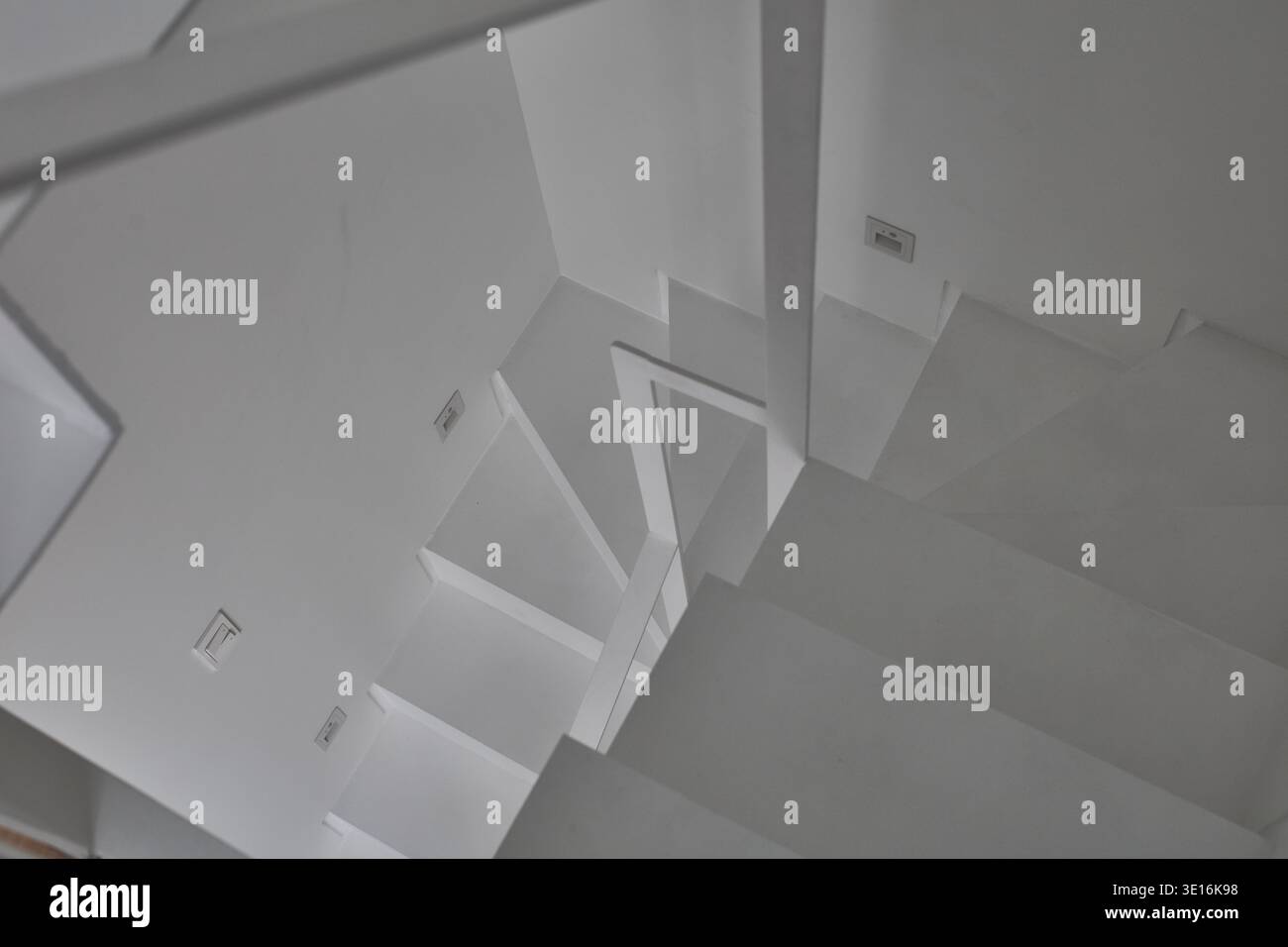 Abstract white stair composition with sharp geometric lines. Stock Photo