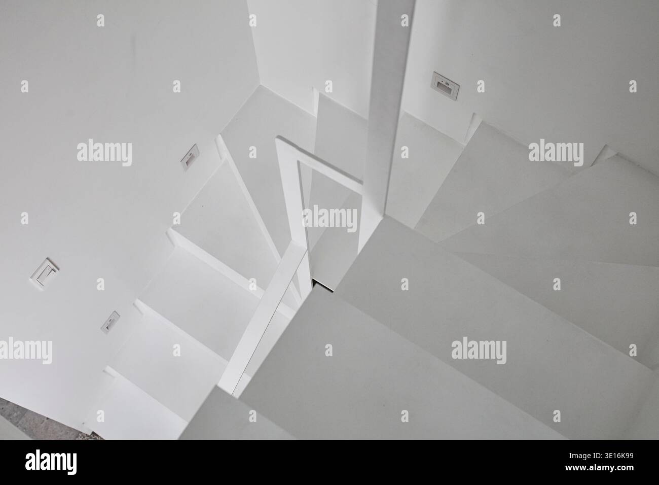 Abstract white stair composition with sharp geometric lines. Stock Photo