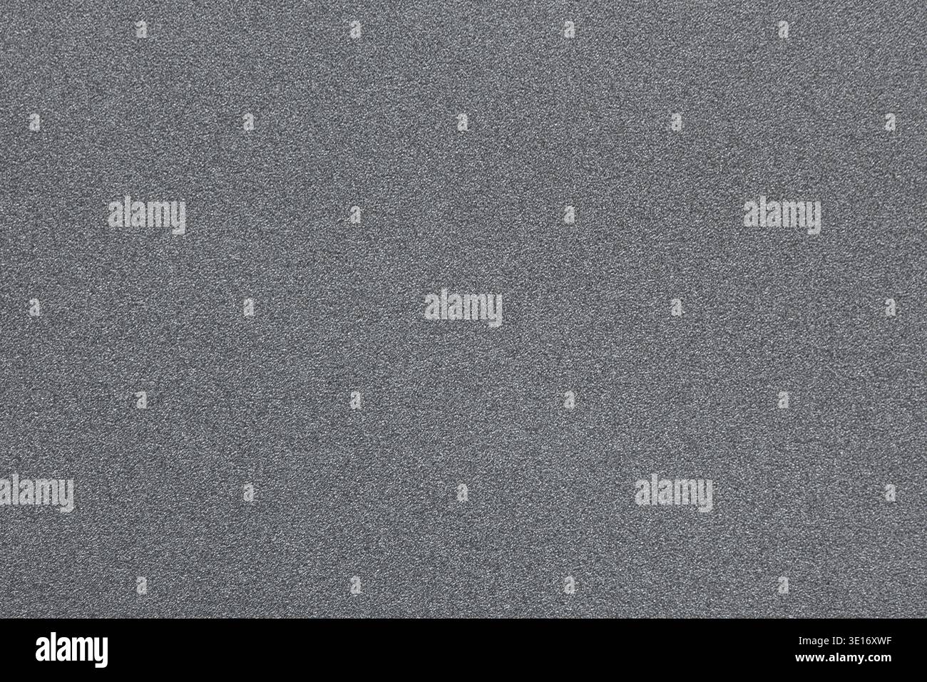 Gray concrete wall showing rough grainy texture as abstract background surface Stock Photo