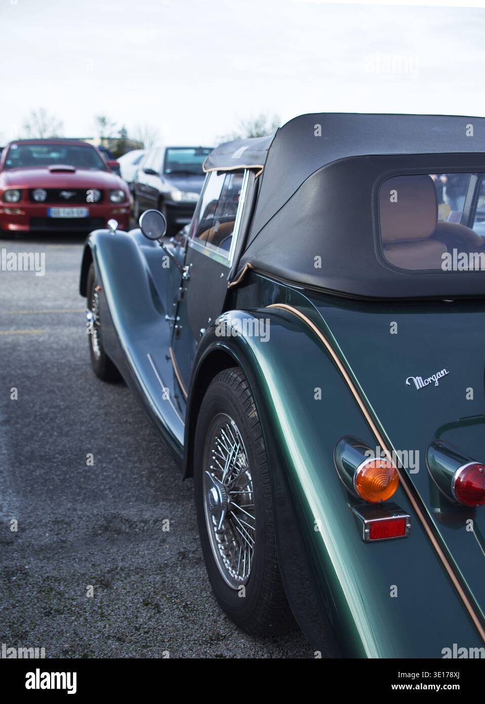 Blue American classic car from the 1950s displayed at vintage car show, retro automobile with chrome bumper and whitewall tires. Stock Photo