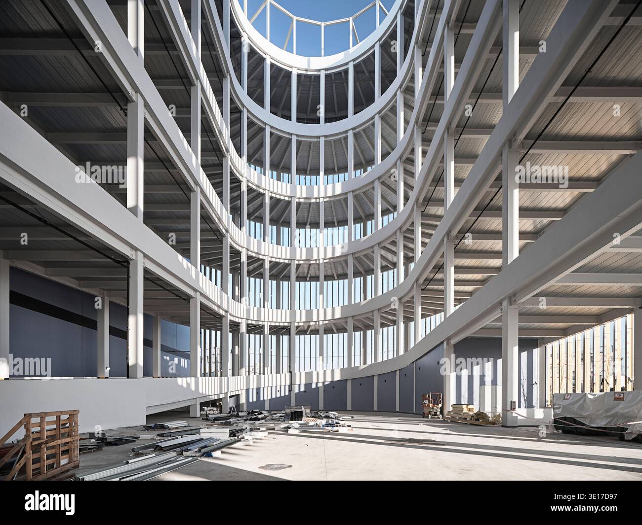 Curving open atrium structure within a large parking facility Stock ...
