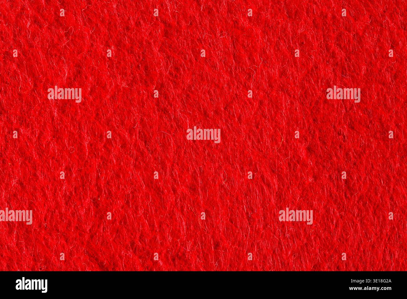 Abstract background with red felt texture, velvet fabric. Stock Photo