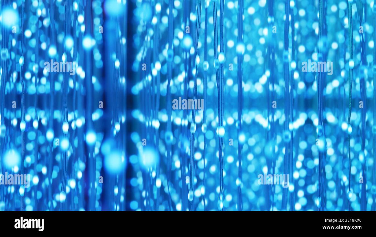 Blue glowing particles creating an abstract digital communication background Stock Photo