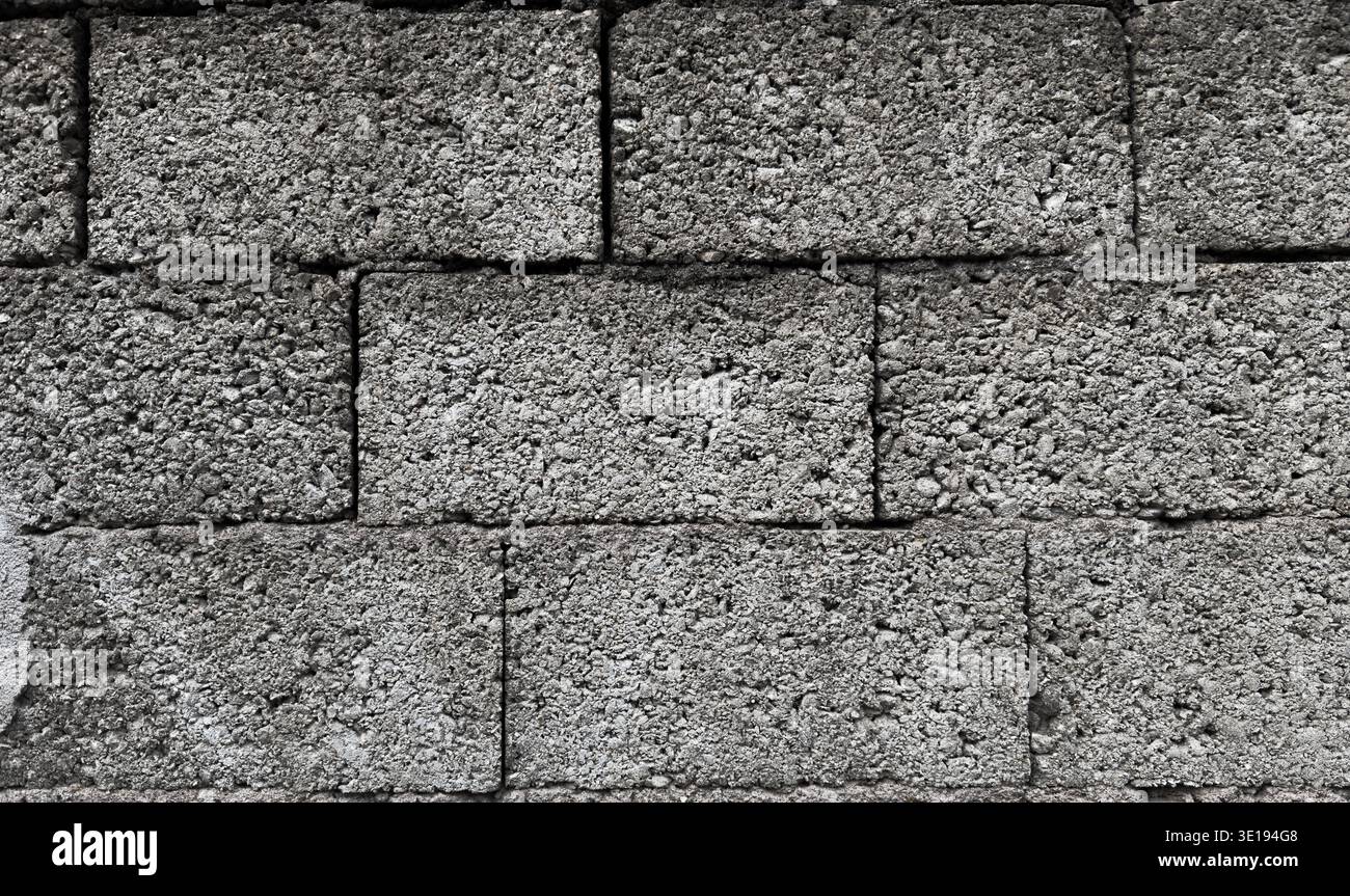 Gray concrete blocks wall pattern industrial background Stock Photo