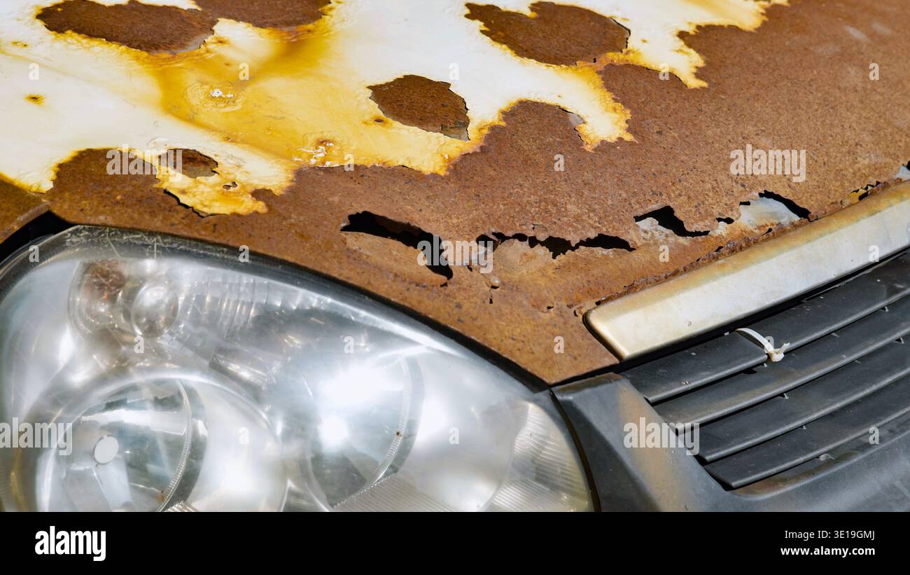 Abandoned car in Moscow showing severe rust and corrosion on hood and ...