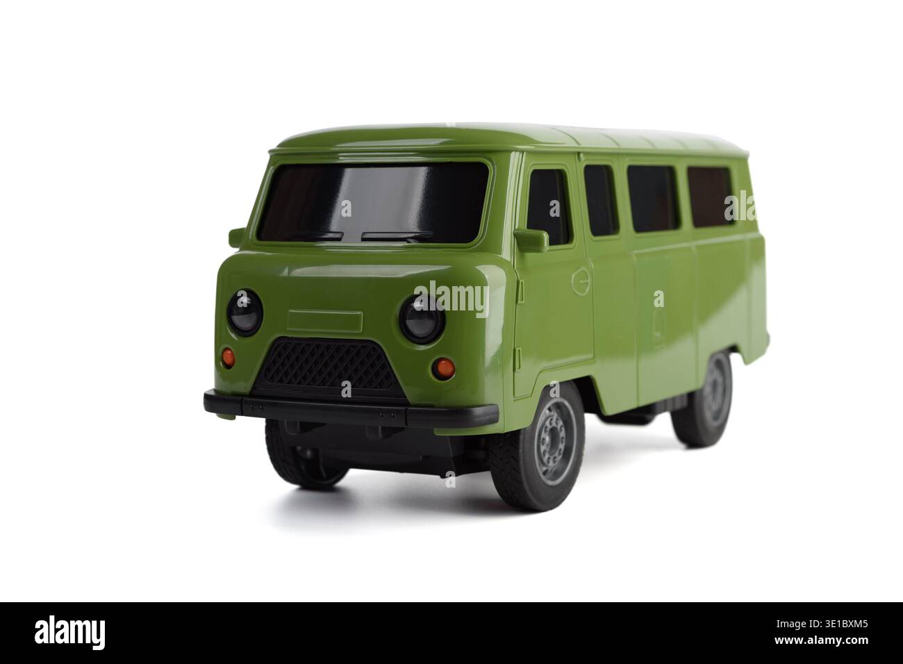 A detailed studio shot of a miniature green UAZ-452 