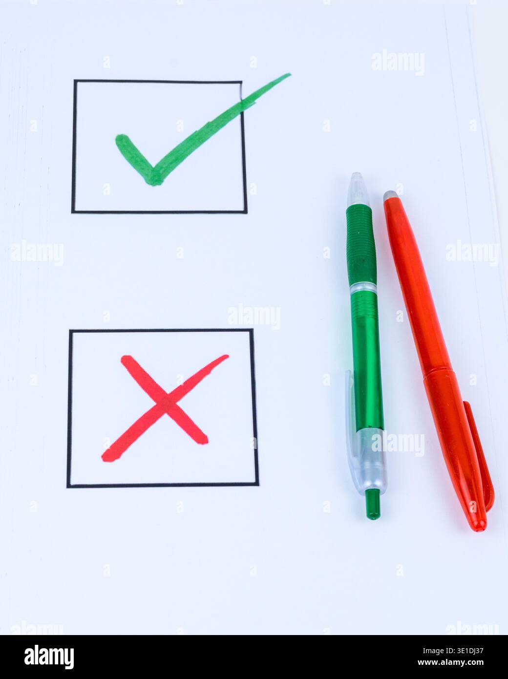 Rejection Tick Close-up of a checklist with green tick and red cross on white paper ...