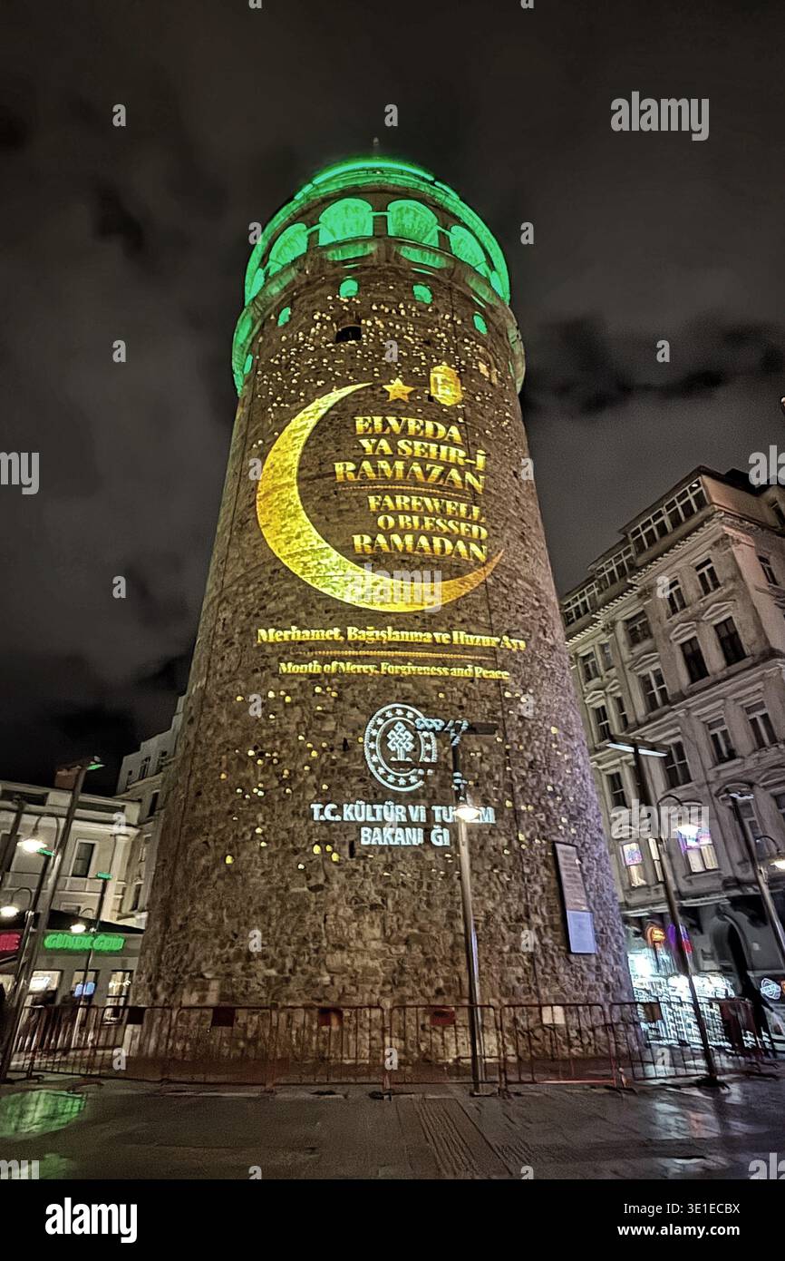 Galata Tower illuminated with crescent moon and star projection marking ...
