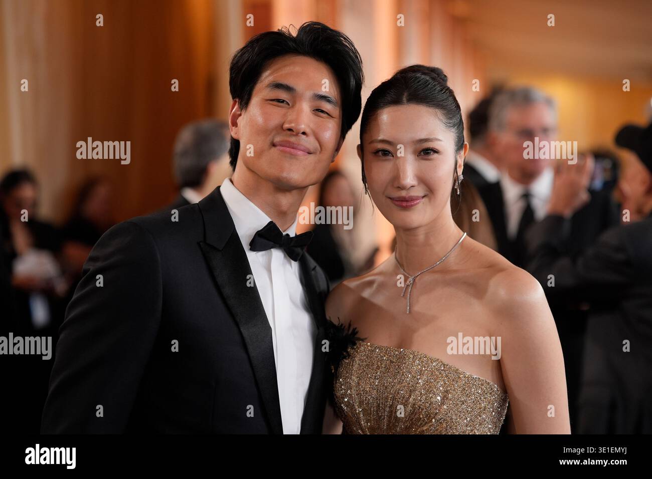 Sam Kim, left, and Ejae arrive at the Oscars on Sunday, March 15, 2026 ...