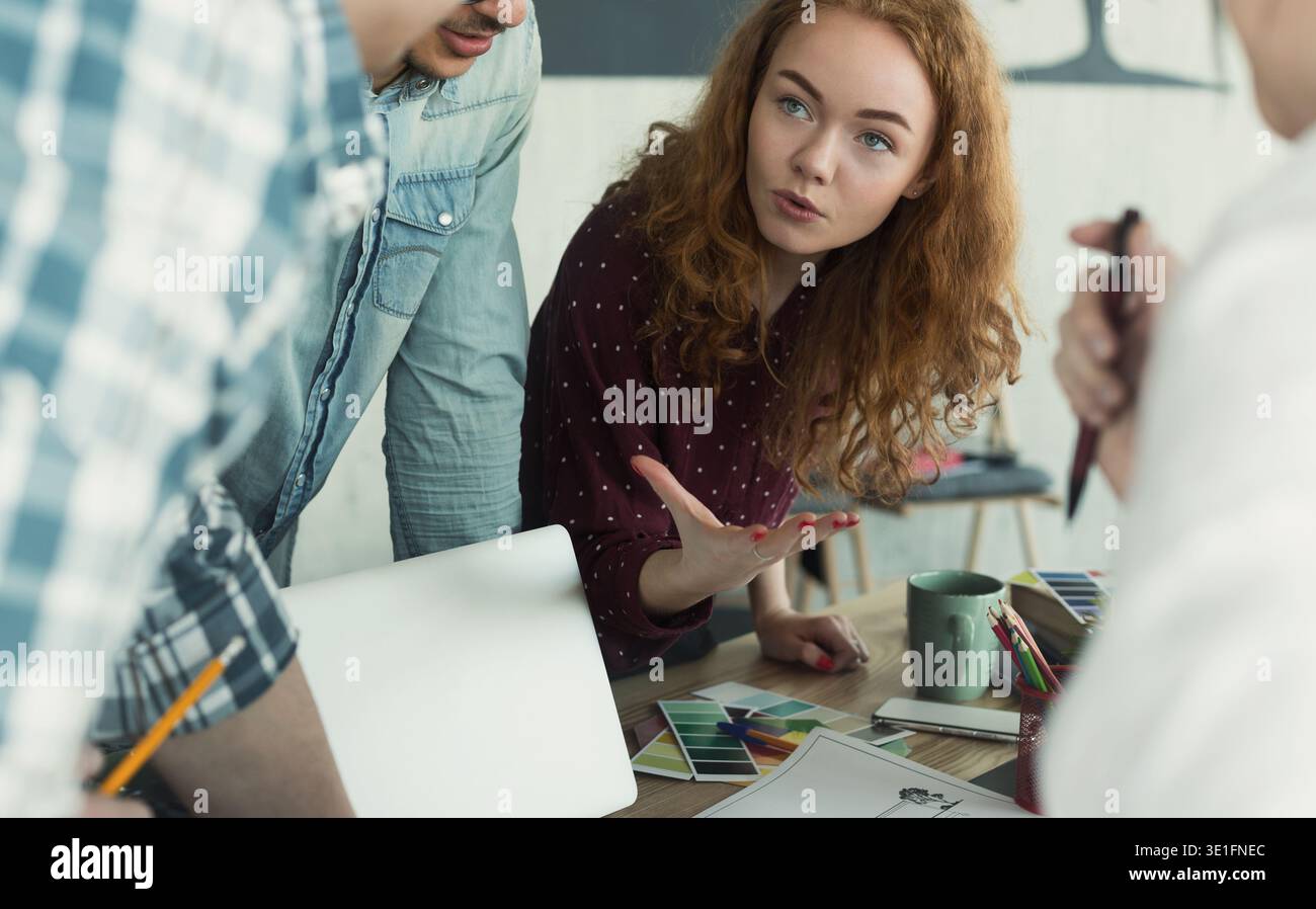 Creative designers having brainstorming meeting in office Stock Photo