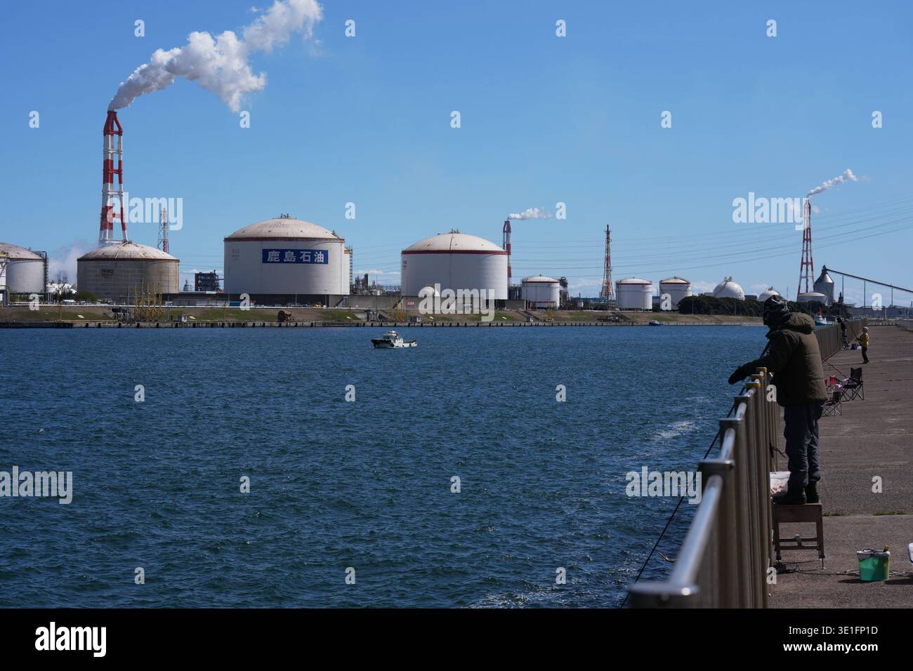 Part of Eneos group's Kashima oil refinery is seen as local residents ...