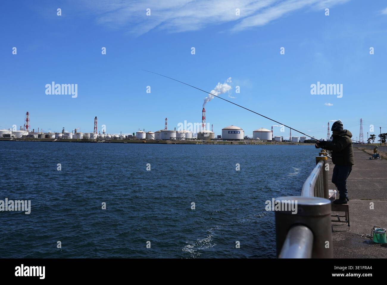 Part of Eneos group's Kashima oil refinery is seen as local residents ...