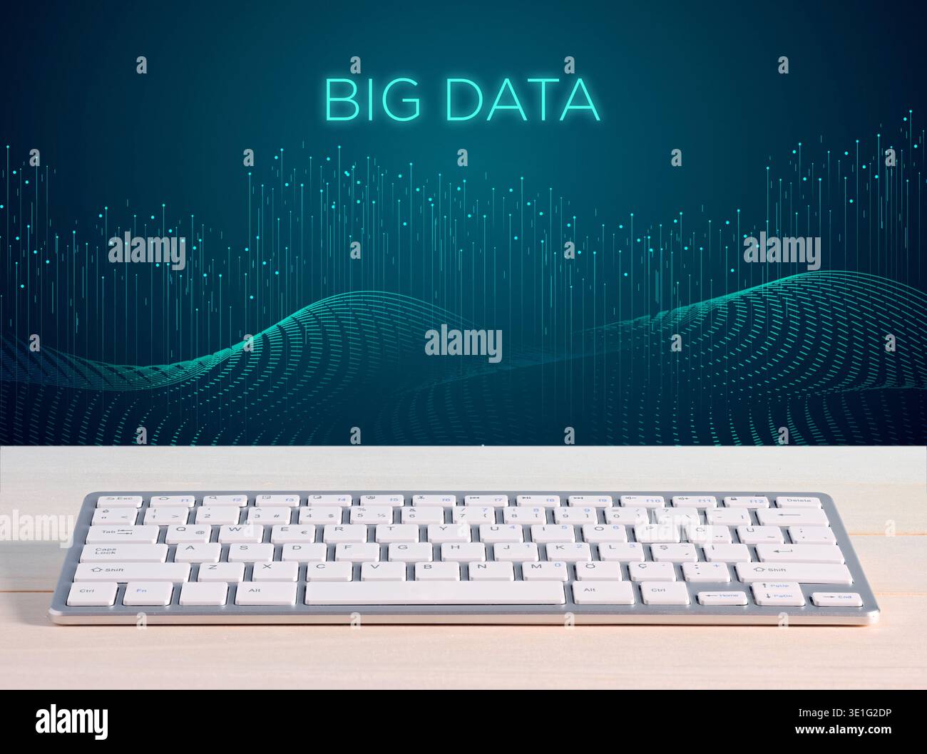 Big Data text on a digital screen, displaying abstract information visualization with a modern computer keyboard. Big data analysis. Stock Photo