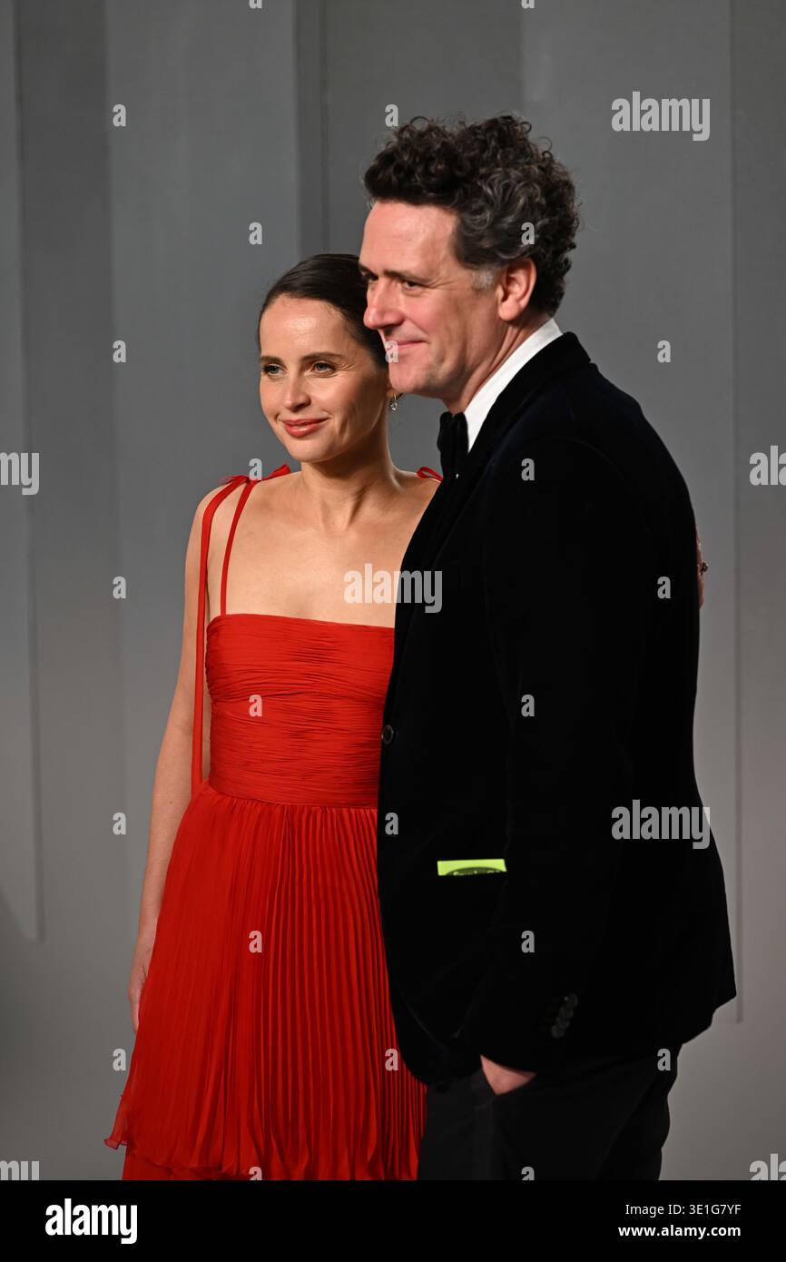 Felicity Guard Felicity Jones and Charles Guard at the Vanity Fair Oscar Party held at ...