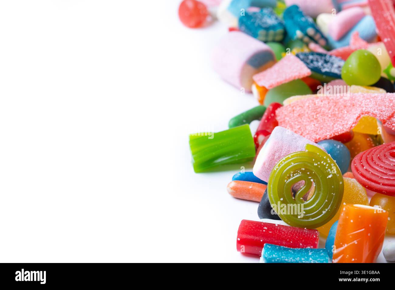 Assorted colorful candies isolated on white background Stock Photo