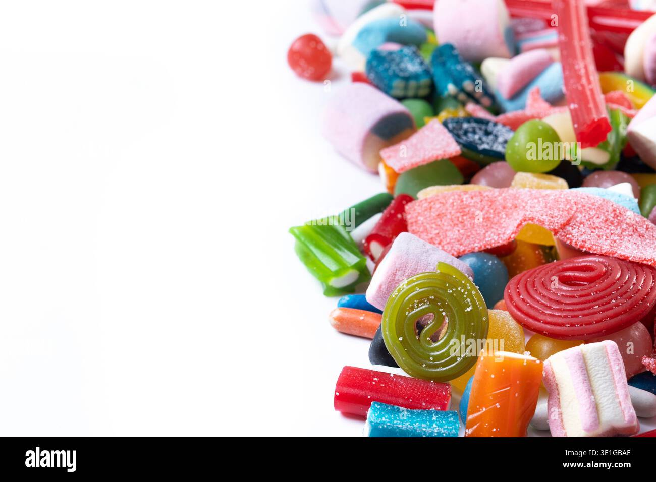 Assorted colorful candies isolated on white background Stock Photo
