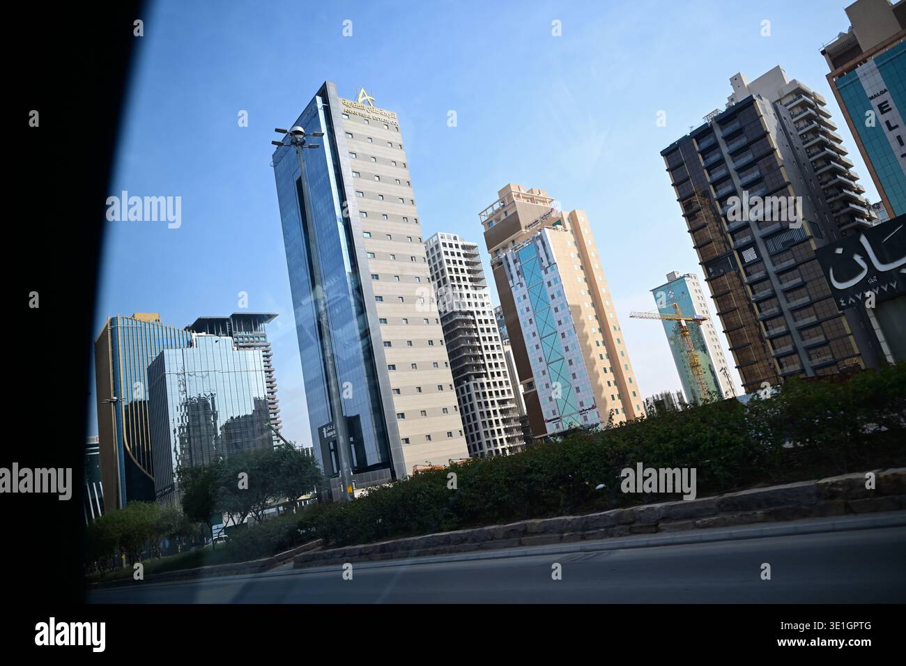11 March 2026, Saudi Arabia, Riad: High-rise buildings stand side by ...