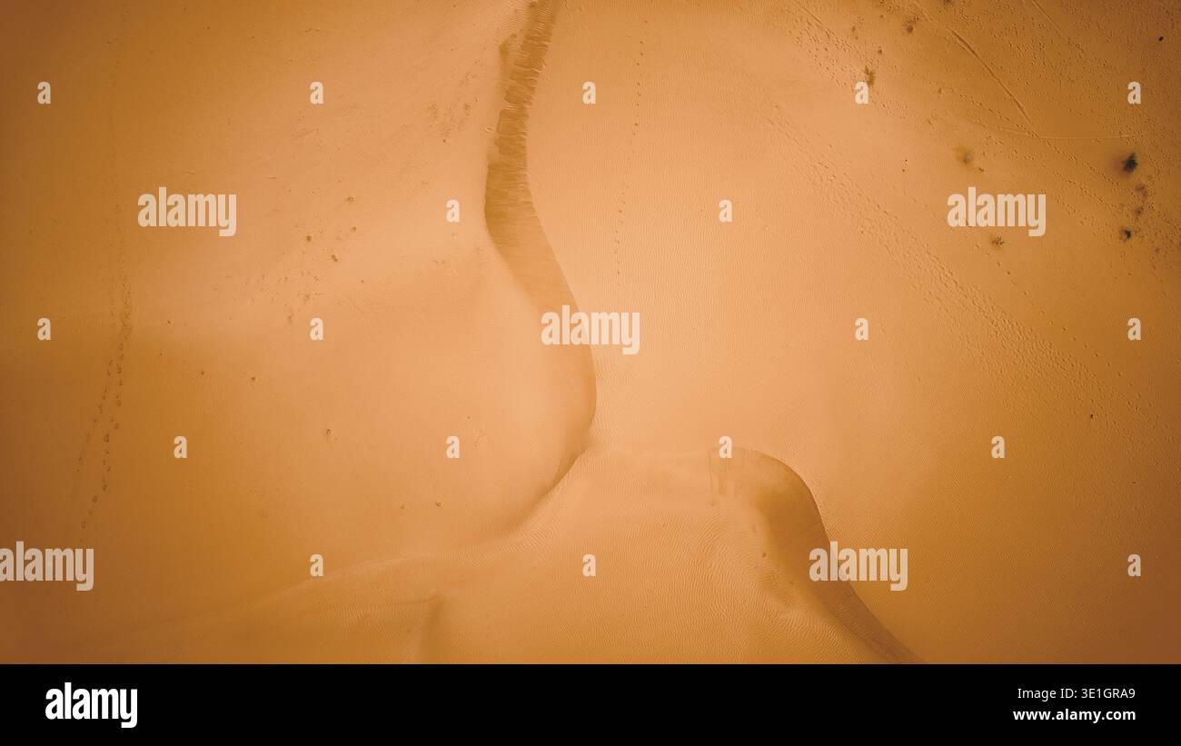 Subtle Views Aerial view of the arid landscape revealing earth tones and subtle ...