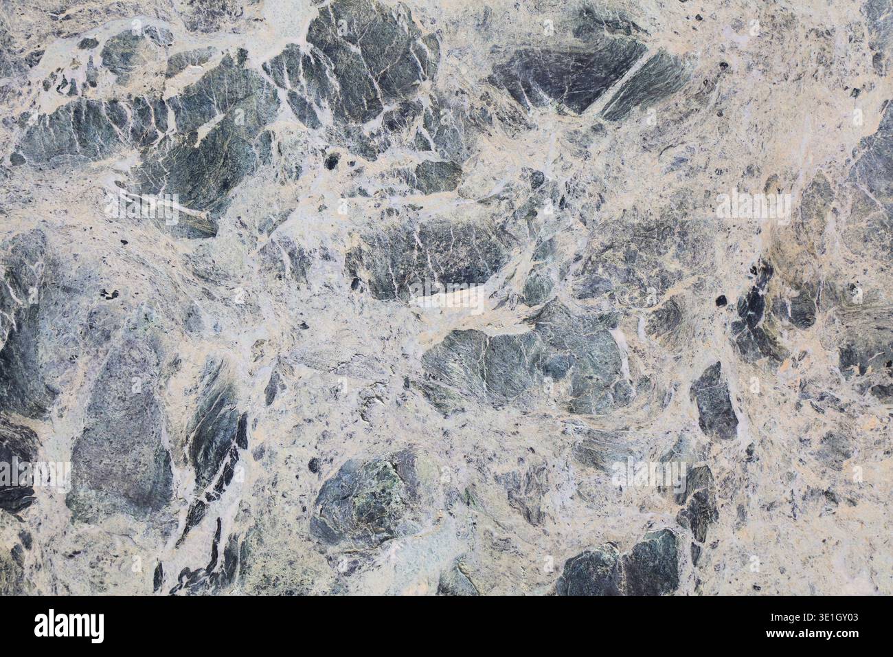 Marble texture background. Blue breccia marble or serpentinite stone surface backdrop. Stock Photo