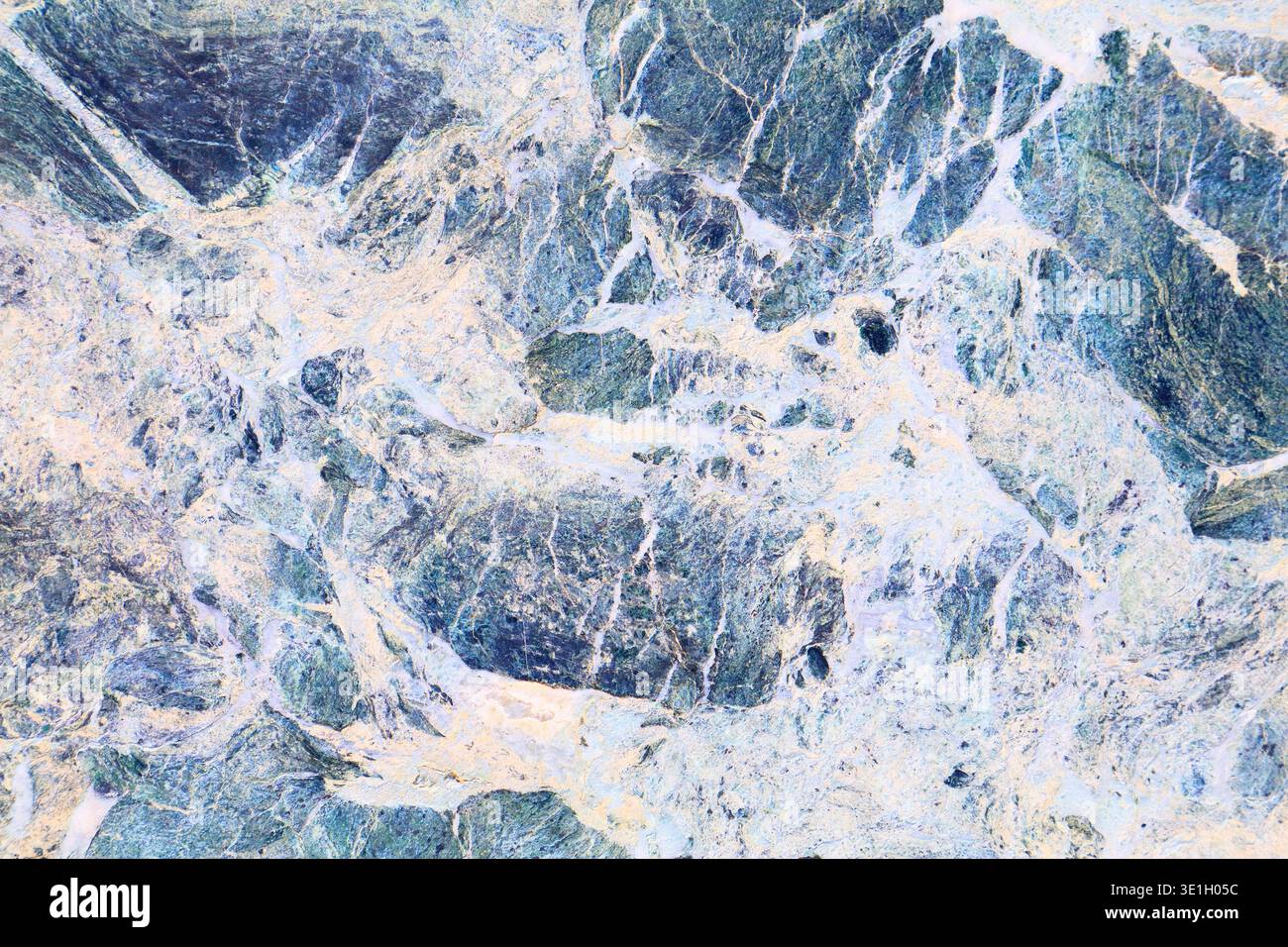 Marble texture background. Blue breccia marble or serpentinite stone surface backdrop. Stock Photo