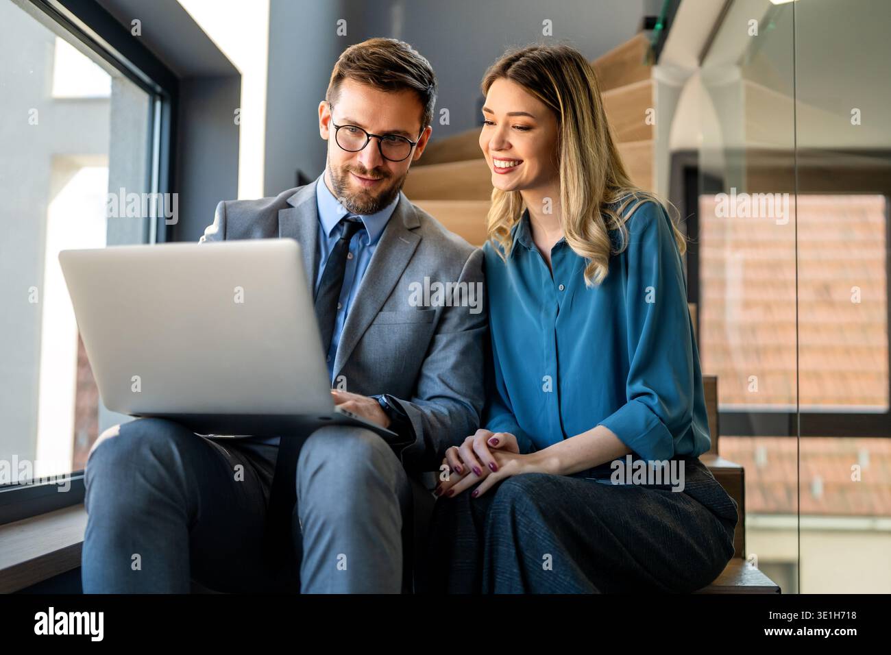 Mixed team of software engineers brainstorming ideas. Diverse app developers collaborating as group Stock Photo