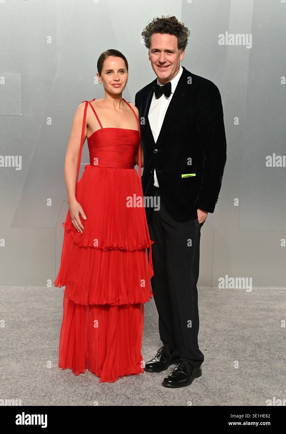 Felicity Guard Felicity Jones and Charles Guard arriving to Vanity Fair Oscar Party ...