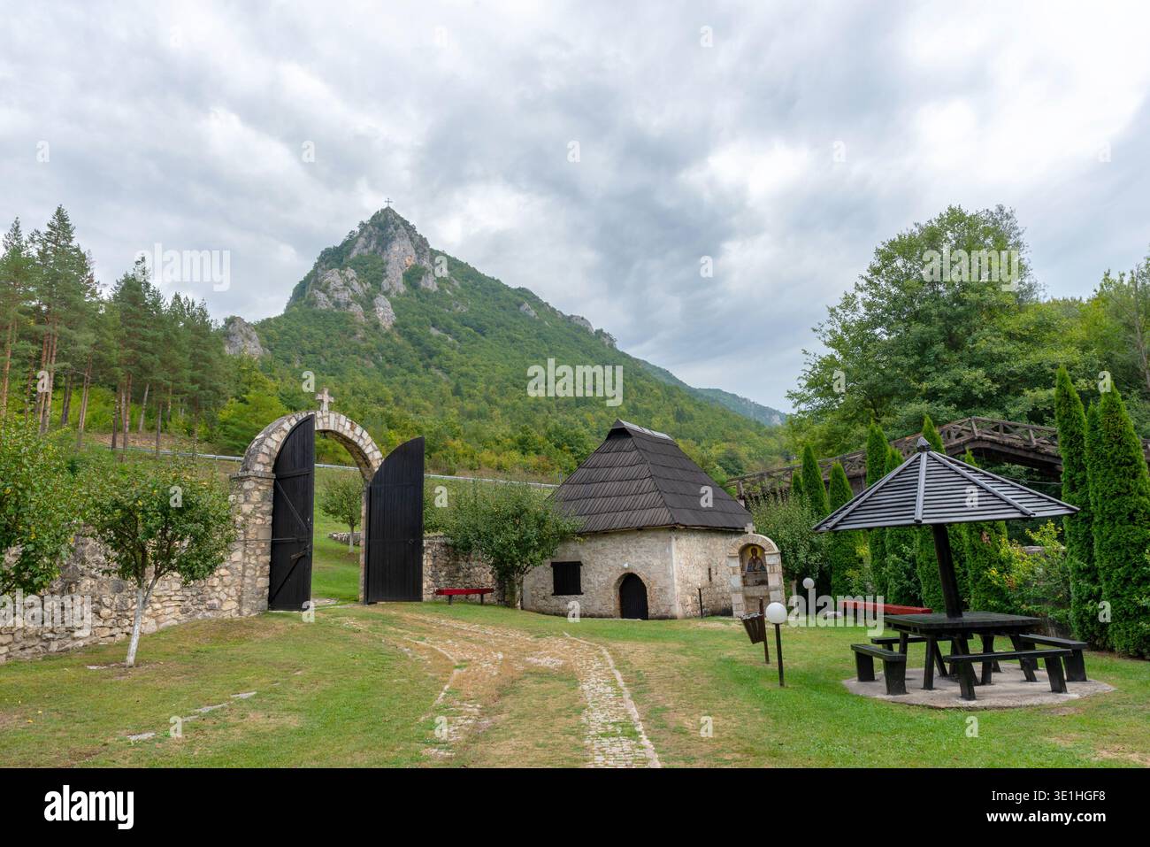 Prijepolje, Serbia - September 16, 2023: Entrance gate and courtyard of Mileševa Monastery surrounded by mountains and nature in southwestern Serbia Stock Photo