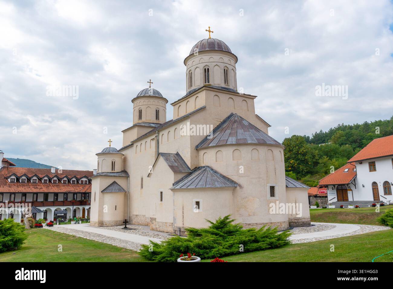 Prijepolje, Serbia - September 16, 2023: Exterior view of the Mileševa Monastery church surrounded by monastery buildings and gardens Stock Photo