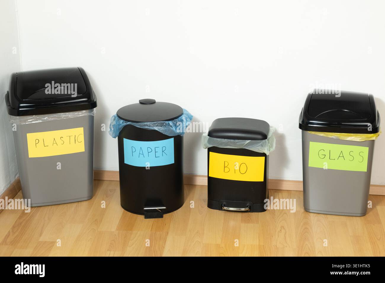 Set of Different Recycling Bins for Plastic Paper Bio Glass. Stock Photo