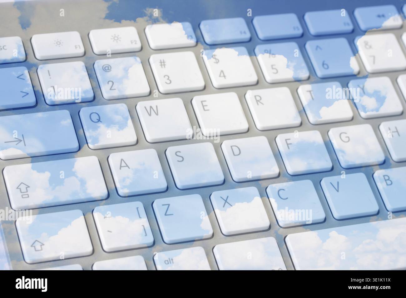 Cloud computing concept - keyboard over cloudscape Stock Photo