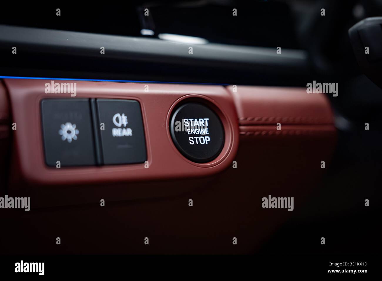 Porsche Panamera 4 push button ignition on red leather dashboard Stock Photo