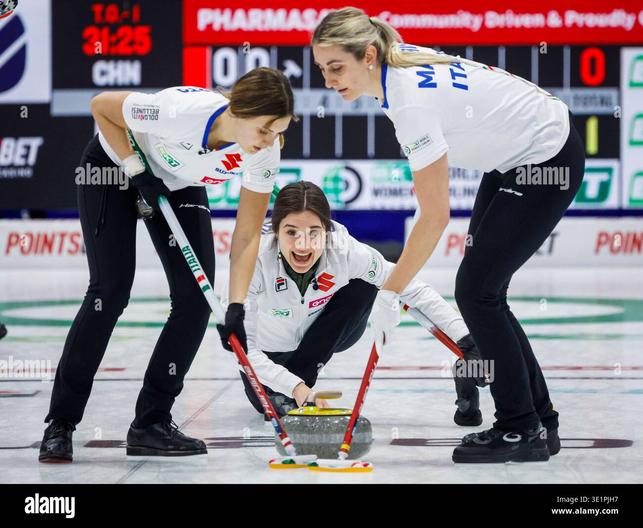 Italy's skip Stefania Constantini, centre, delivers a stone against ...