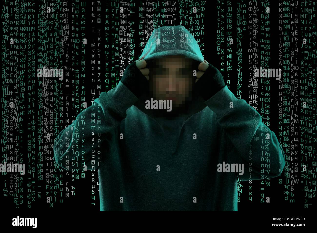 Hacker wearing hood and programming code running through him. Cyber criminal Stock Photo