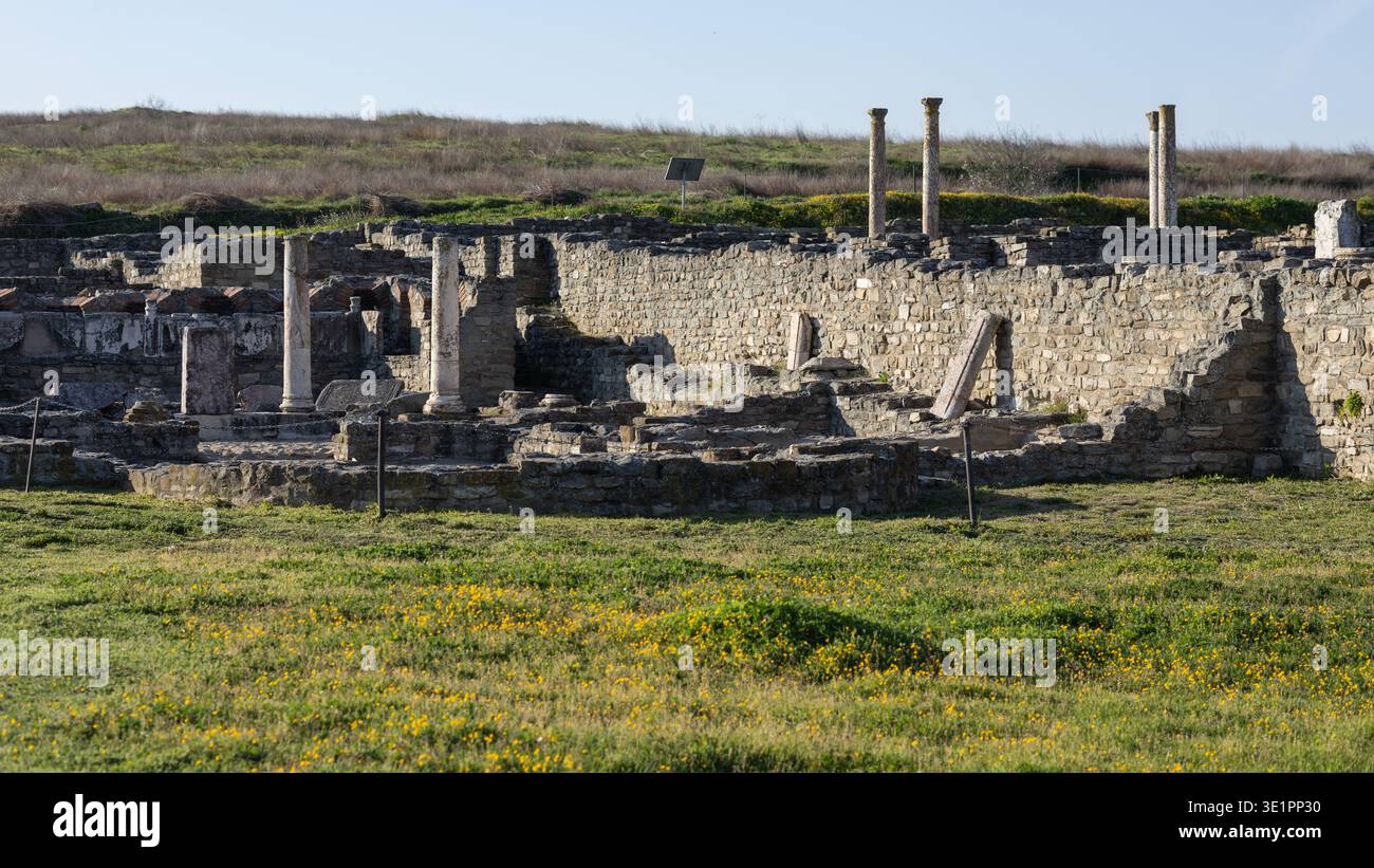 ancient roman stone ruins with weathered columns and crumbling walls ...