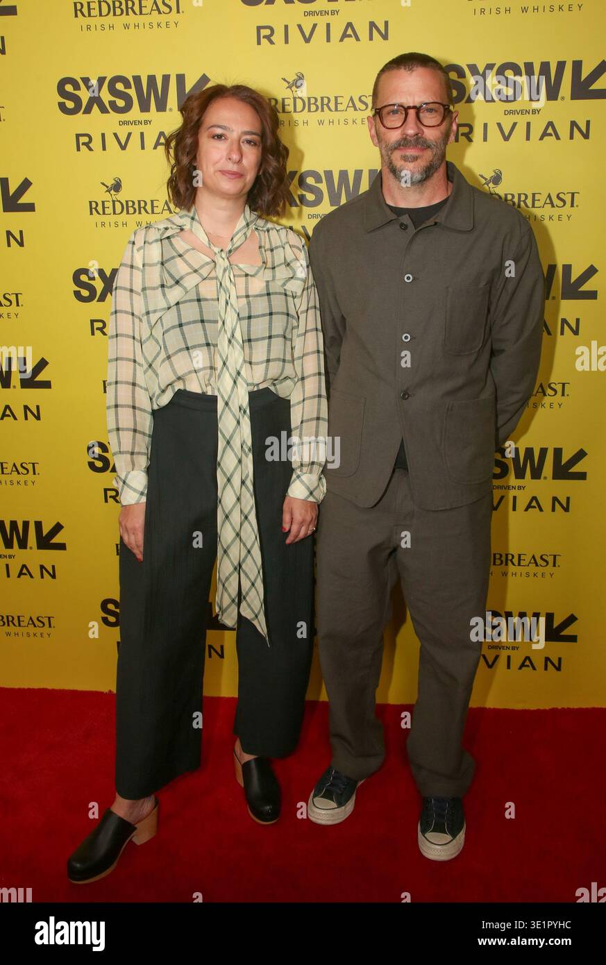Alison Small, left, and Marc Marrie arrive for the world premiere of ...