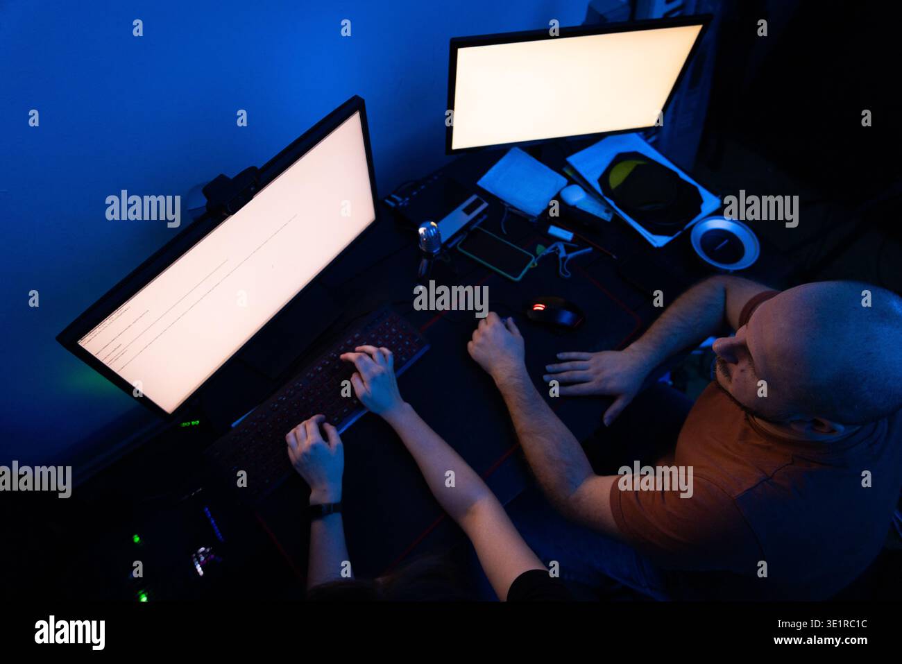 Top View of Couple Using Computer Together Stock Photo