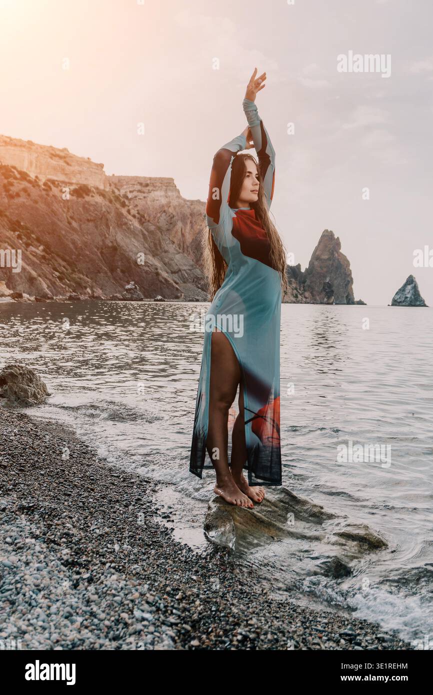 Woman standing in water wearing dress hi-res stock photography and images -  Alamy