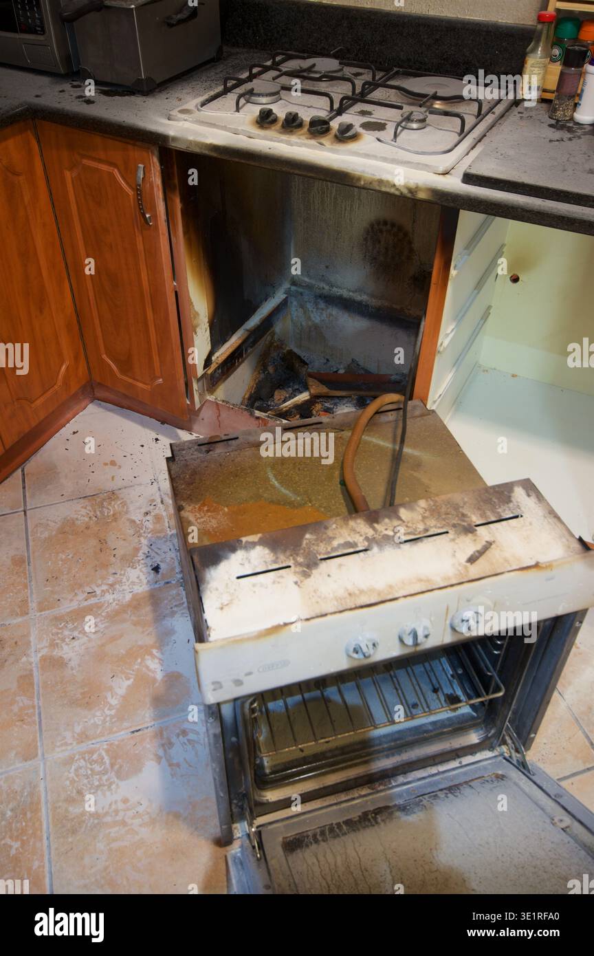 Domestic over in the aftermath of a fire Stock Photo