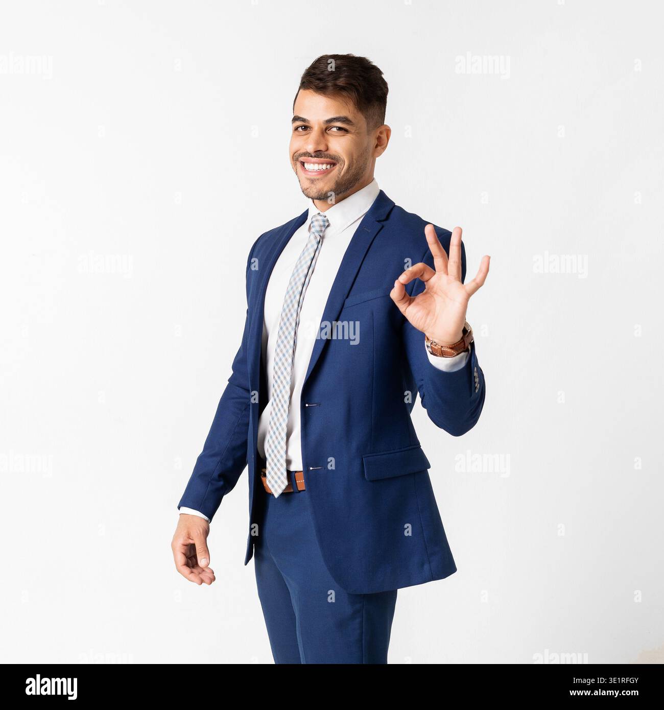 Happy Arab Man Smiling And Gesturing OK Sign Stock Photo