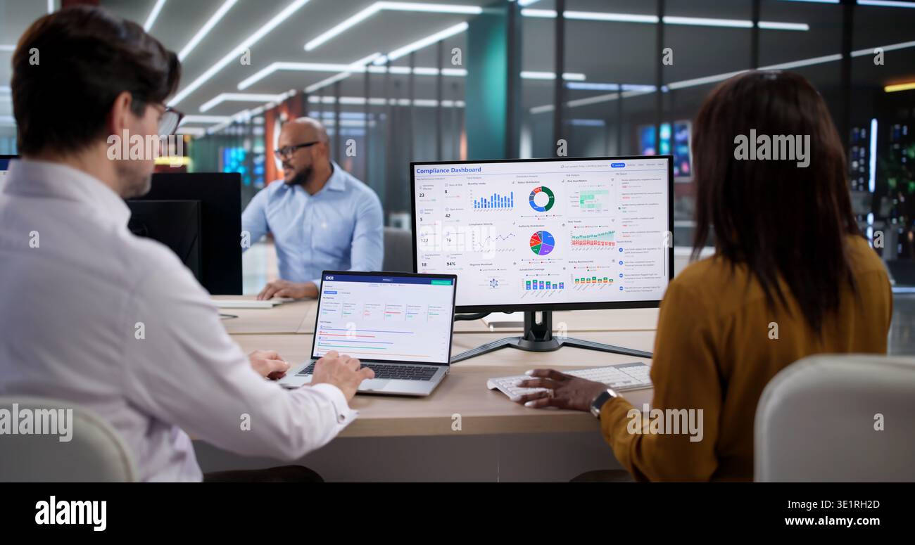 An African Woman Using A Laptop Inspects Privacy Compliance For Corporate Governance Stock Photo