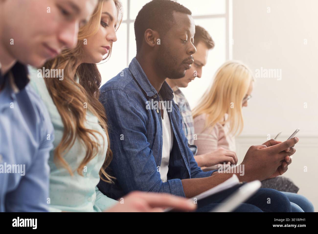 Group of business people using gadgets Stock Photo