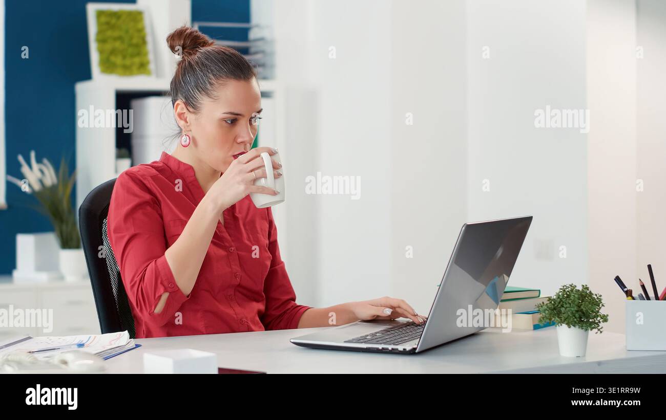 Office worker planning sales statistics report on laptop, working with financial research and business charts for company growth. Female accountant using network to create data analysis. Stock Photo