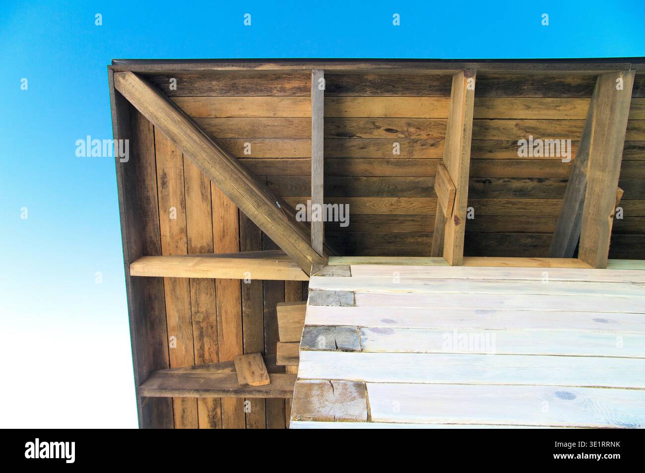 Roof angle. Hip roof rafter system. timber wall. Stock Photo