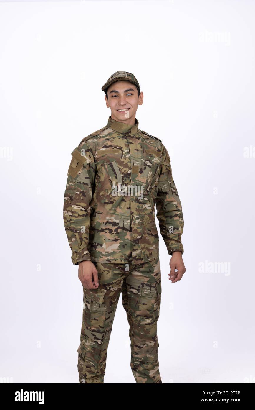 Soldier in camouflage uniform looking at the camera Stock Photo