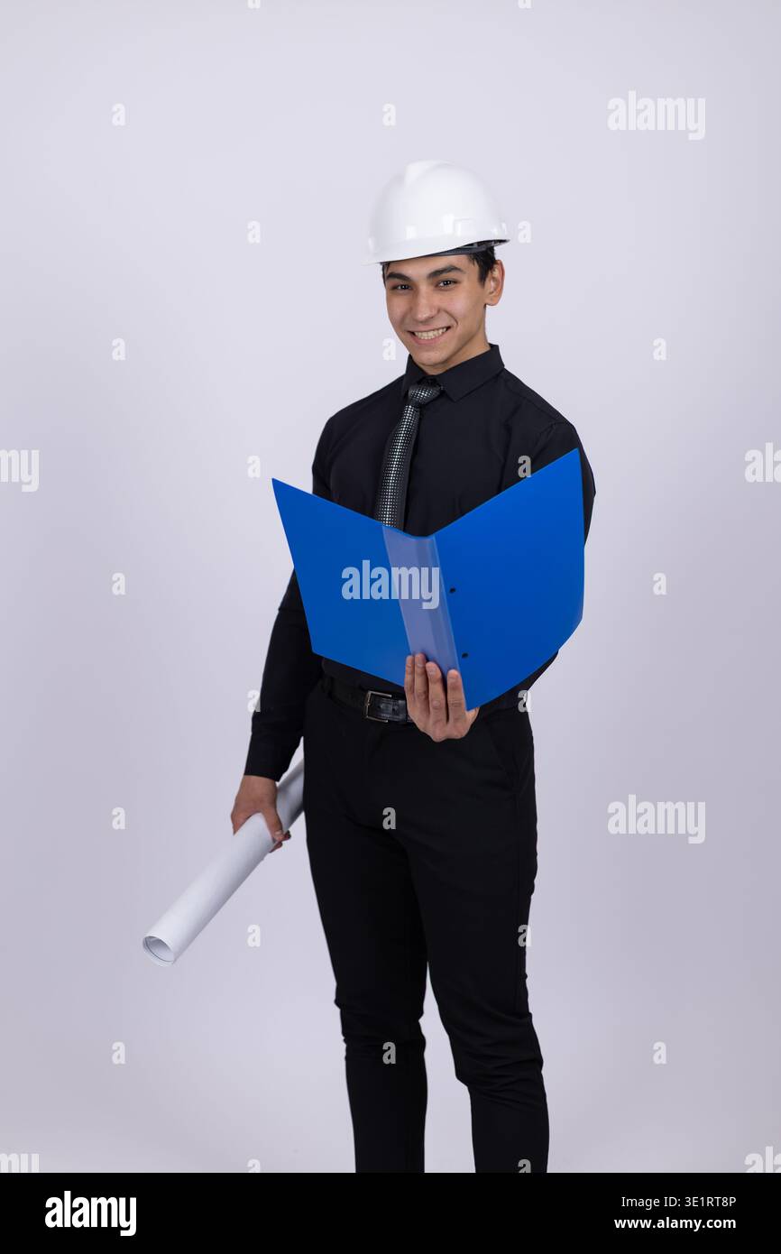 Architect holding blue folder looking at camera Stock Photo