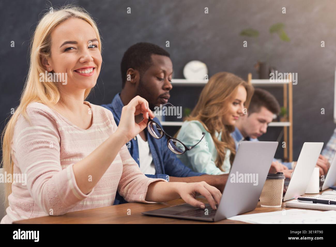 Programmers working in software developing company Stock Photo