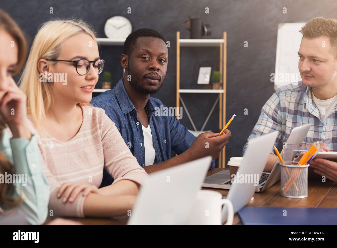 Programmers working in software developing company Stock Photo