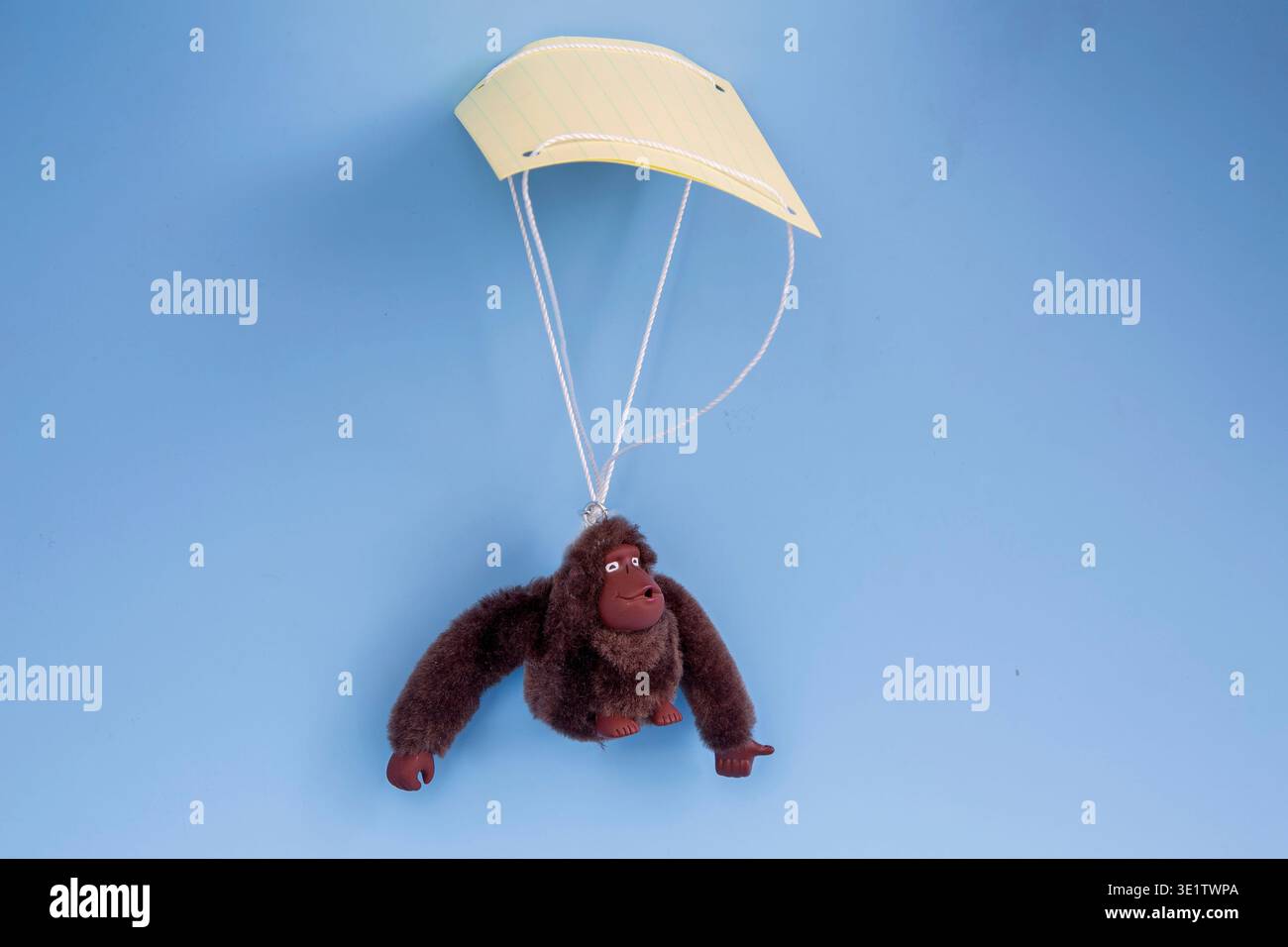 toy monkey with a paper parachute, intended to be dropped as a resistance demonstration. Stock Photo